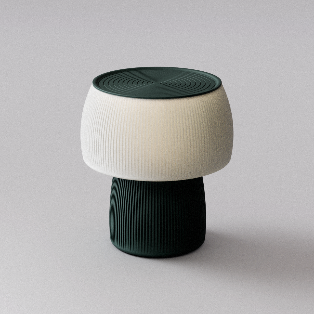 Small round lamp with ribbed texture and green top on a light gray background